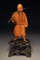 Foto-4-Plastika-rybare-symbol-klidu-a-harmonie-s-prirodou-zimostrazove-drevo-Cina-foto-Pavel-Krasensky